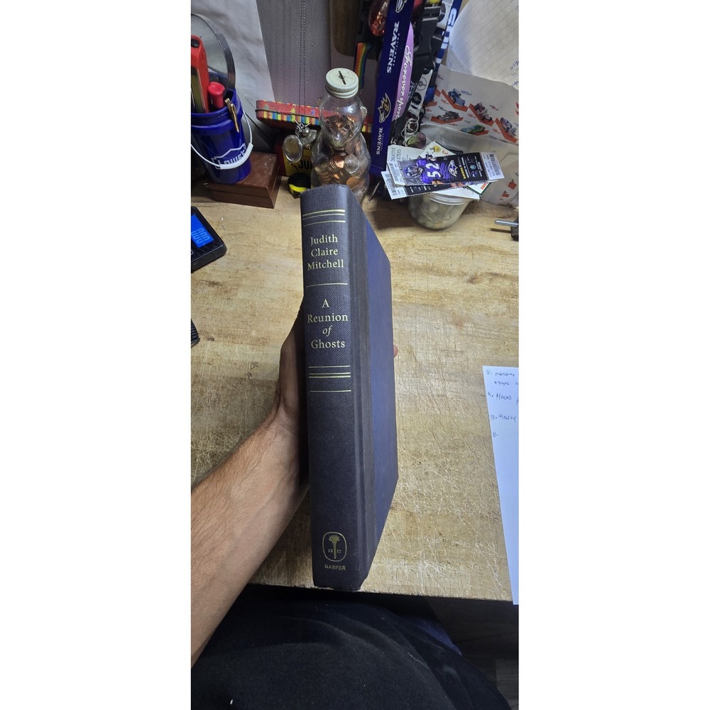 hardcover copy of the novel A Reunion of Ghosts by Judith Claire Mitchell